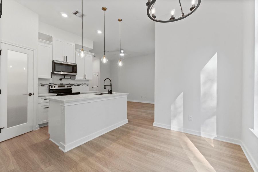 Furnished interior view inside a new home in , Conroe (Image 11).