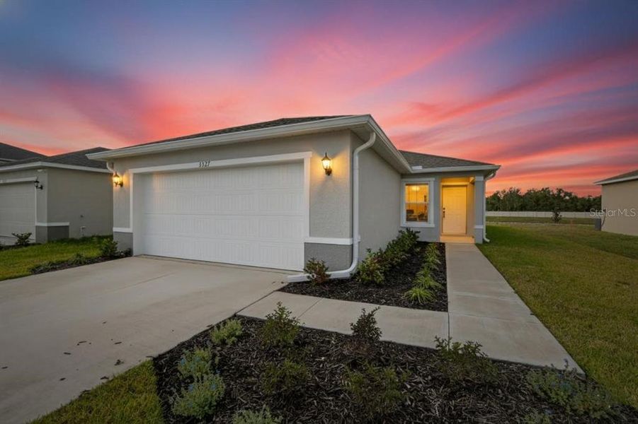 Front exterior of a new home in , Palmetto, FL, highlighting curb appeal (Image 1). Front exterior of a new home in , Palmetto, FL, highlighting curb appeal (Image 1).