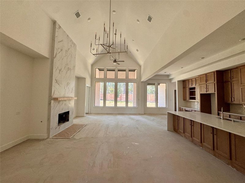 Soaring Ceilings in Family Room with Open Concept Kitchen
