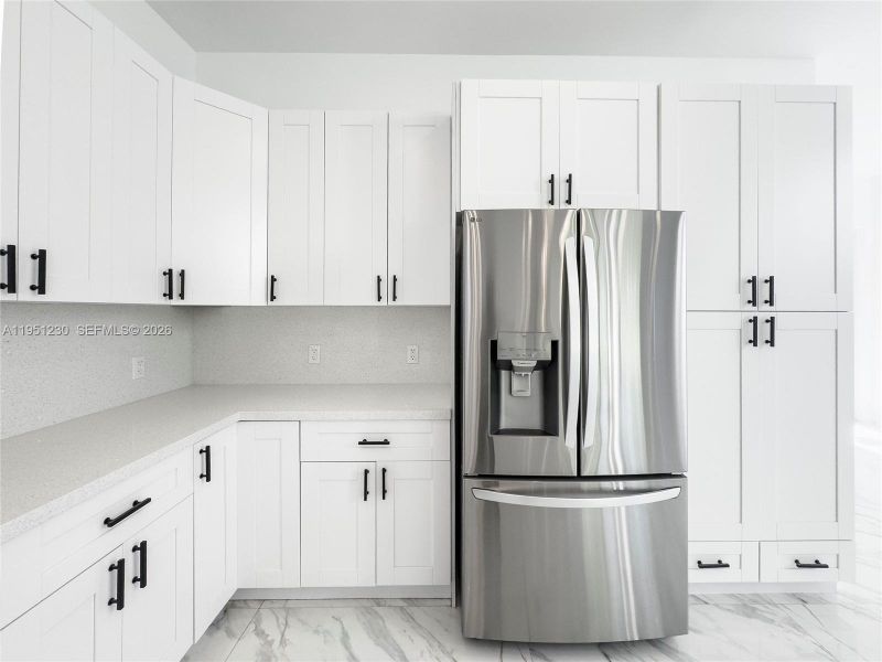 Furnished interior view inside a new home in , Port St. Lucie (Image 8).