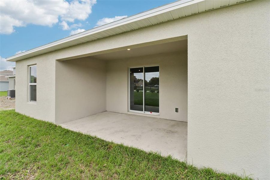 Exterior details and patio area of a home in Sumter Villas, Sumterville (Image 24).