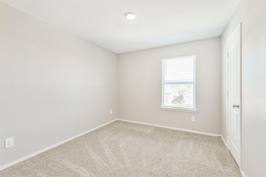 Spacious, unfurnished interior of a new home in Harrington Trails at The Canopies, New Caney (Image 27).