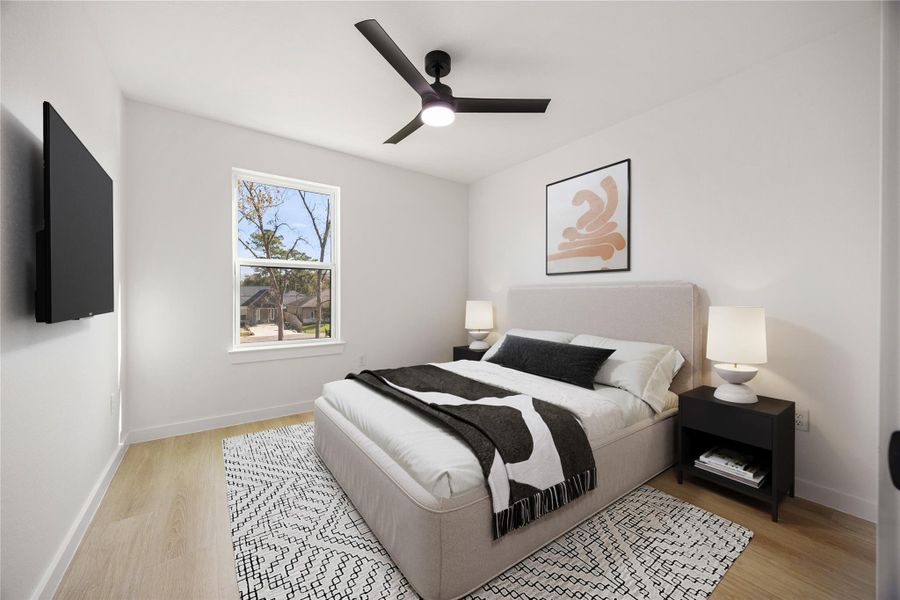 Comfortable secondary bedroom offering a ceiling fan, modern finishes, and a well-sized layout with natural light, perfect for everyday living. *Virtually Staged Comfortable secondary bedroom offering a ceiling fan, modern finishes, and a well-sized layout with natural light, perfect for everyday living. *Virtually Staged