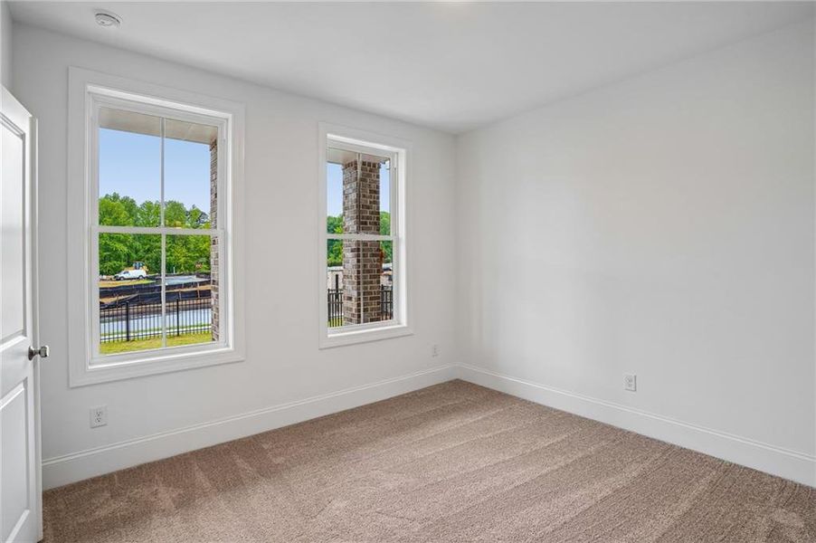Spacious, unfurnished interior of a new home in Waterhaven, Cumming (Image 39).