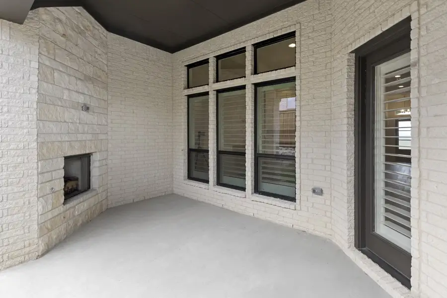 Exterior details and patio area of a home in Nelson Lake Estates, Rockwall (Image 3).