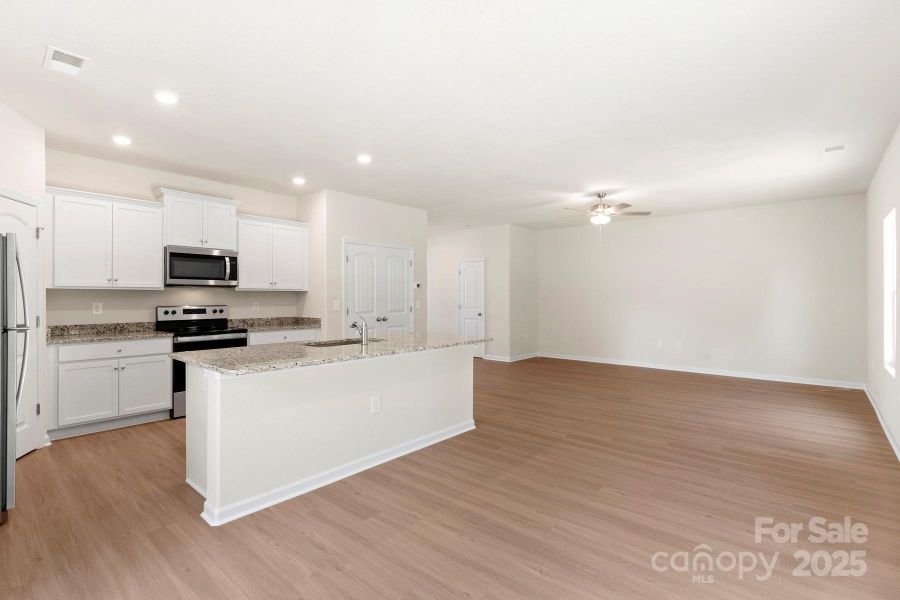 Furnished interior view inside a new home in Stagecoach Station, Gastonia (Image 6).