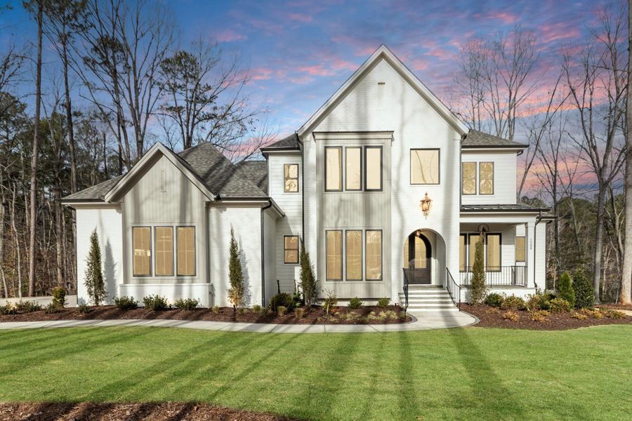 Representative exterior photo of a completed home built from the Bellevue English Cottage by Homes by Dickerson in Cattail, Clayton, NC (Image 2). Representative exterior photo of a completed home built from the Bellevue English Cottage by Homes by Dickerson in Cattail, Clayton, NC (Image 2).
