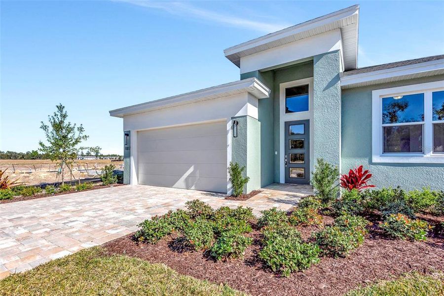 Exterior details and patio area of a home in The Reserve at Victoria, Deland (Image 4).