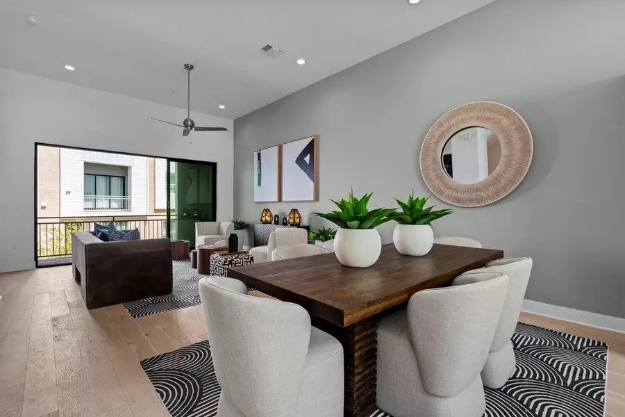 Hardwood floors and high ceilings define this open, airy dining space. Hardwood floors and high ceilings define this open, airy dining space.
