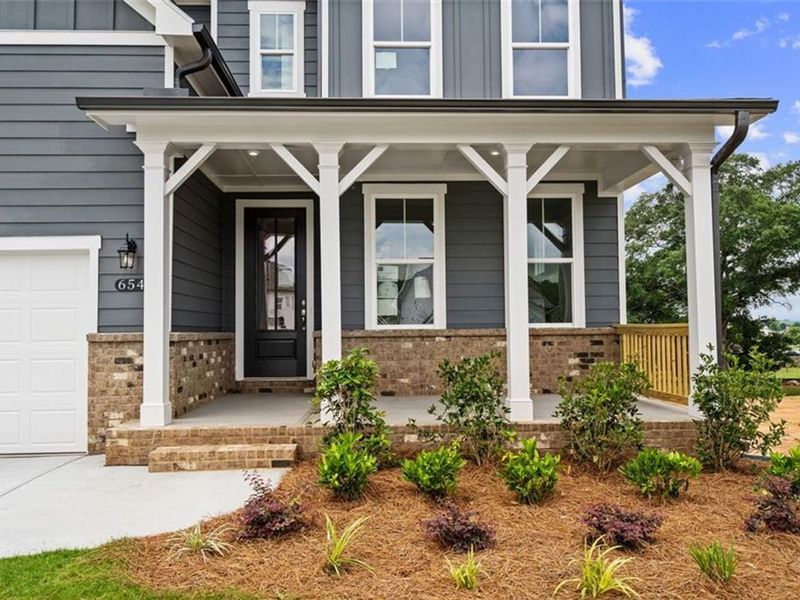 Exterior details and patio area of a home in Wehunt Meadows, Hoschton (Image 3).