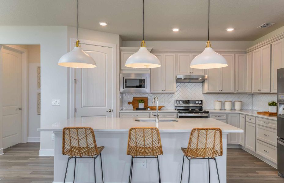 Open Kitchen with Island and Large Pantry