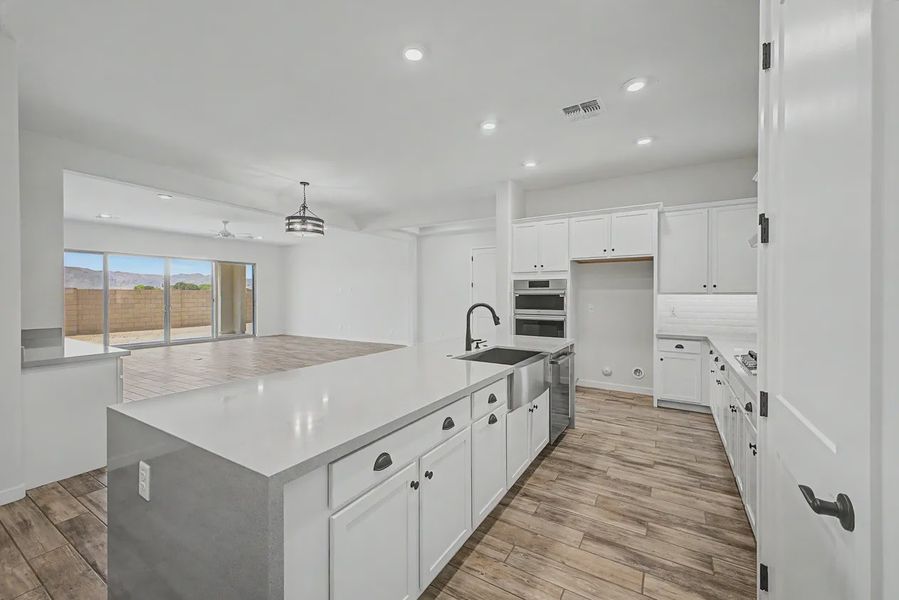 Furnished interior view inside a new home in Valencia at Granite Vista, Waddell (Image 8).