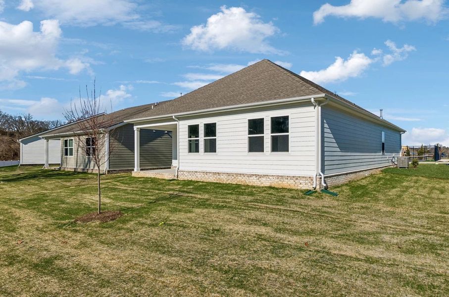 Exterior details and patio area of a home in Cedars of Cane Ridge | 55+ Community, Antioch (Image 22).