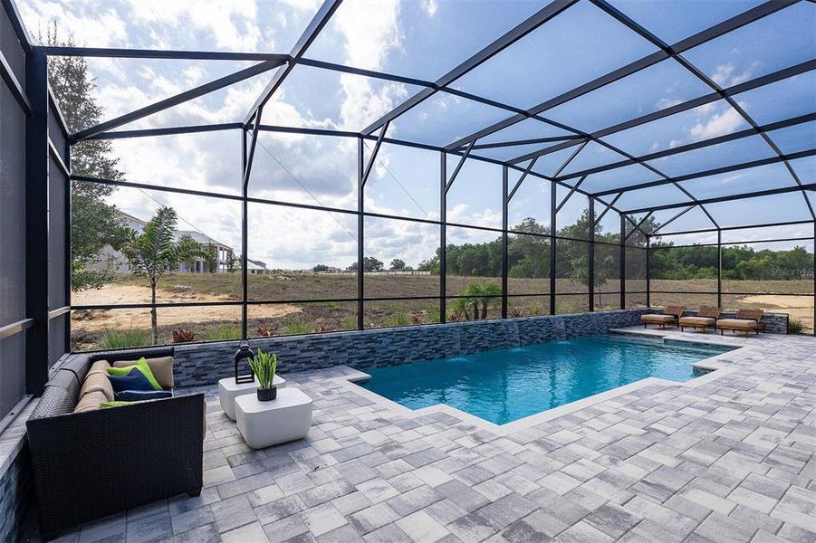 Exterior details and patio area of a home in Emerson Pointe, Apopka (Image 1). Exterior details and patio area of a home in Emerson Pointe, Apopka (Image 1).