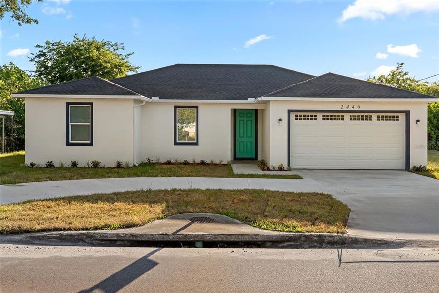 Front exterior of a new home in , Sanford, FL, highlighting curb appeal (Image 1). Front exterior of a new home in , Sanford, FL, highlighting curb appeal (Image 1).