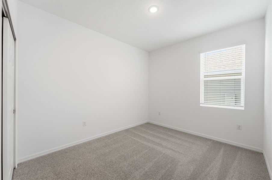 Representative unfurnished interior of a home built from the Haven by Risewell Homes in Cypress Bluff, Groveland (Image 19).
