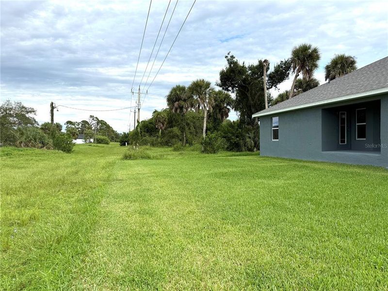 Front exterior of a new home in Rotonda, Rotonda West, FL, highlighting curb appeal (Image 15). Front exterior of a new home in Rotonda, Rotonda West, FL, highlighting curb appeal (Image 15).