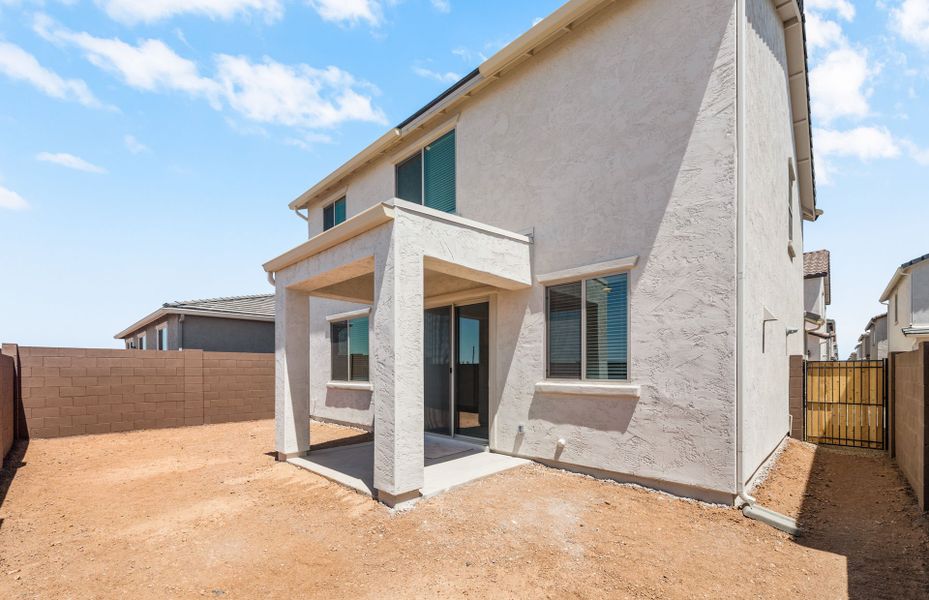 Exterior details and patio area of a home in Asante- Atrium Series, Surprise (Image 3).