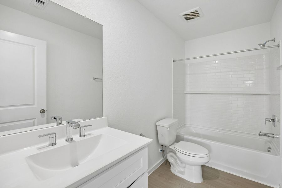 Furnished interior view inside a new home in Windcress, Cove (Image 8).