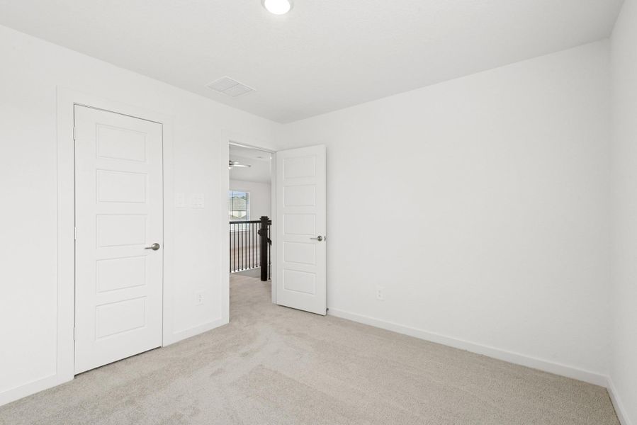 Spacious, unfurnished interior of a new home in Lone Star Landing, Montgomery (Image 34).