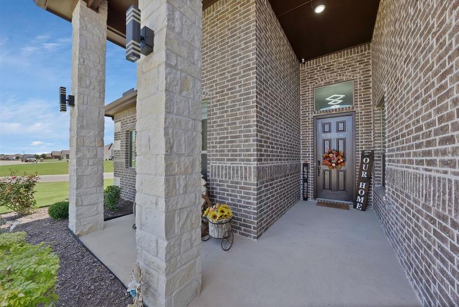 Entrance to property featuring brick siding Entrance to property featuring brick siding