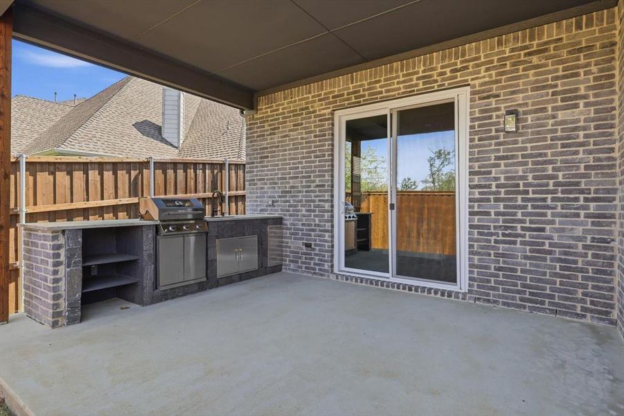 Exterior details and patio area of a home in , Denton (Image 27).