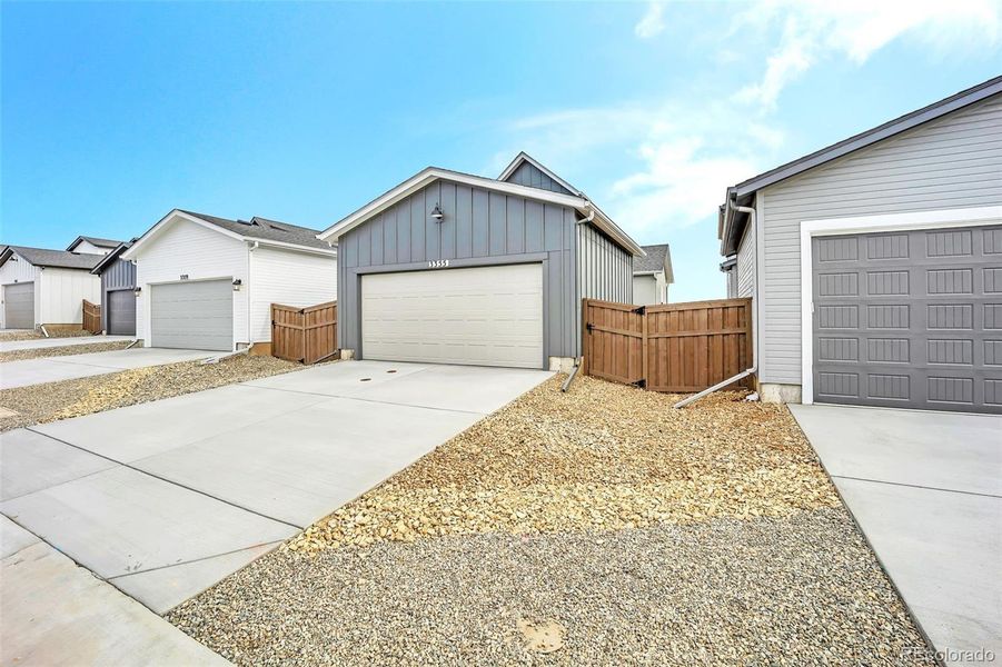 Front exterior of a new home in , Colorado Springs, CO, highlighting curb appeal (Image 2). Front exterior of a new home in , Colorado Springs, CO, highlighting curb appeal (Image 2).