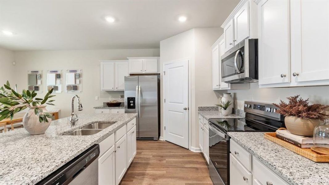 Furnished interior view inside a new home in The Landing at Hidden Lakes, McKinney (Image 23). Furnished interior view inside a new home in The Landing at Hidden Lakes, McKinney (Image 23).