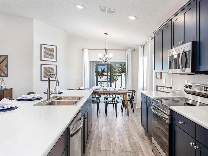 Dine at the island, or in the sunny cafe - Parker by Highland Homes