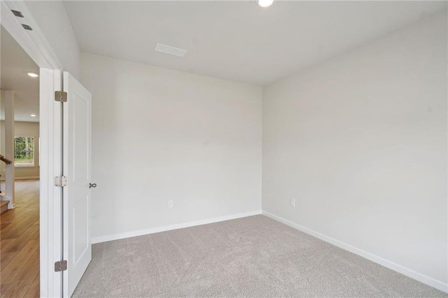 Spacious, unfurnished interior of a new home in Westmont Preserve, Powder Springs (Image 37).