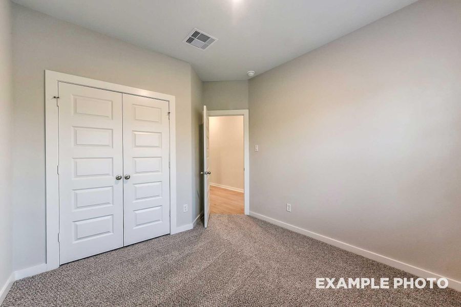 Spacious, unfurnished interior of a new home in Sunterra, Katy (Image 18).