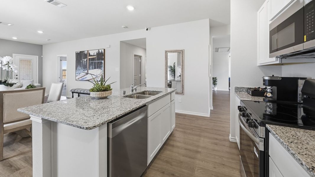 Furnished interior view inside a new home in Crane Crossing, Crandall (Image 4).