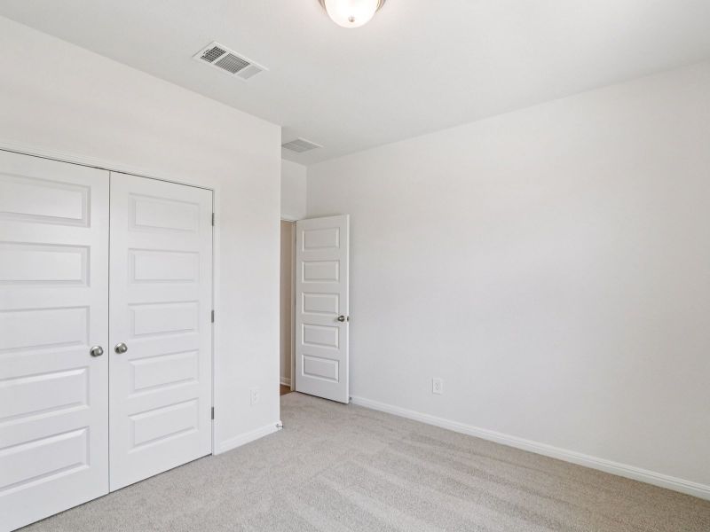 Spacious, unfurnished interior of a new home in Prairie Winds - Executive Collection, Hutto (Image 16).