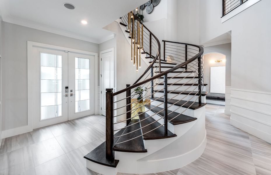 Main House Foyer with Grand Spiral Staircase