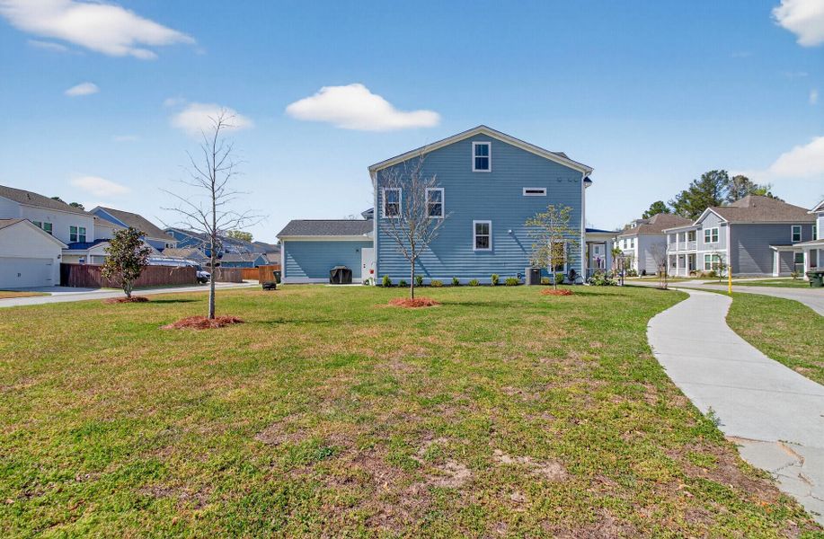 Exterior details and patio area of a home in Twin Lakes, Johns Island (Image 31).