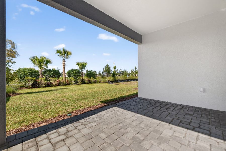 Exterior details and patio area of a home in Crosswind Ranch, Parrish (Image 2).