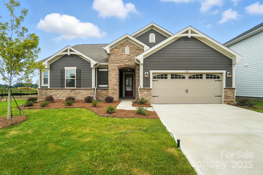 Front exterior of a new home in Waxhaw Landing, Monroe, NC, highlighting curb appeal (Image 16).