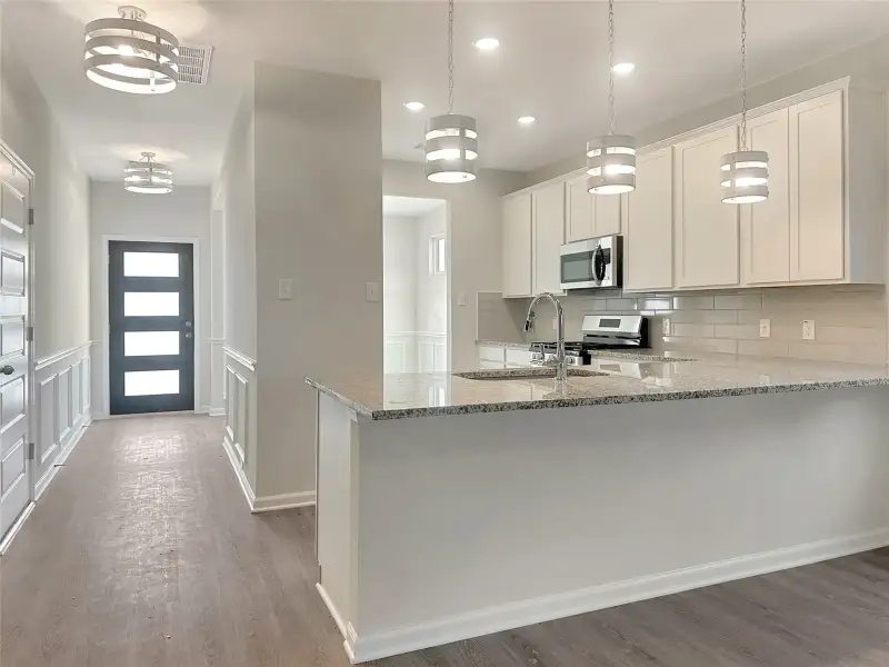 The Caldwell- Kitchen. Home is under construction. Sample image for illustration; upgrades, options, and colors may vary.