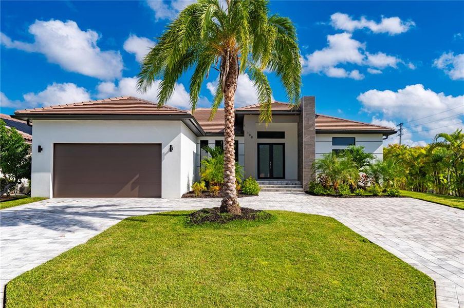 Front exterior of a new home in , Punta Gorda, FL, highlighting curb appeal (Image 25).