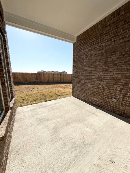 Exterior details and patio area of a home in , Iowa Colony (Image 3).