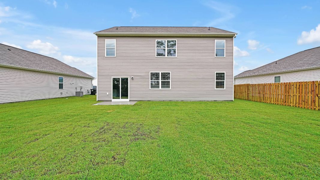 Representative exterior photo of a completed home built from the Hayden by D.R. Horton in The Grove at Blake Farm, Wilmington, NC (Image 19).