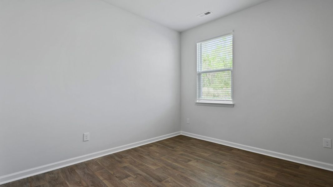 Representative unfurnished interior of a home built from the DOWNING by D.R. Horton in The Oaks at Center Station, Hollywood (Image 14).
