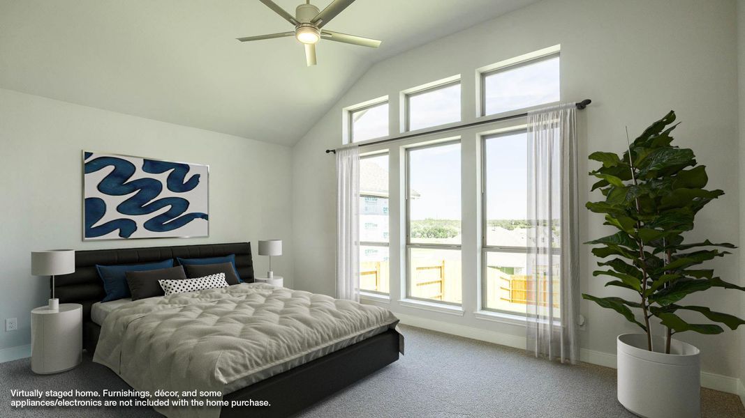 Bedroom featuring baseboards, vaulted ceiling, and carpet flooring Bedroom featuring baseboards, vaulted ceiling, and carpet flooring