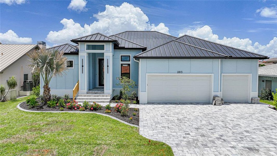 Front exterior of a new home in , Punta Gorda, FL, highlighting curb appeal (Image 21). Front exterior of a new home in , Punta Gorda, FL, highlighting curb appeal (Image 21).