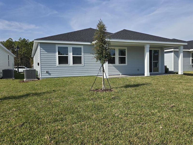 Exterior details and patio area of a home in Colbert Landings, Palm Coast (Image 2).