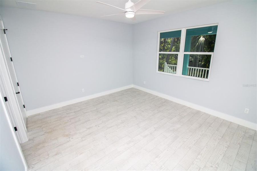 Spacious, unfurnished interior of a new home in , New Smyrna Beach (Image 11).