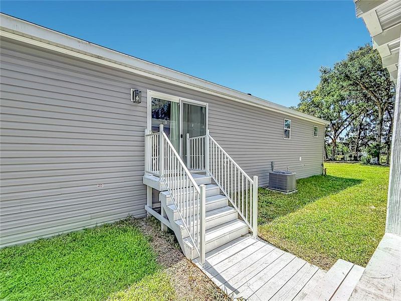 Exterior details and patio area of a home in , Summerfield (Image 3).