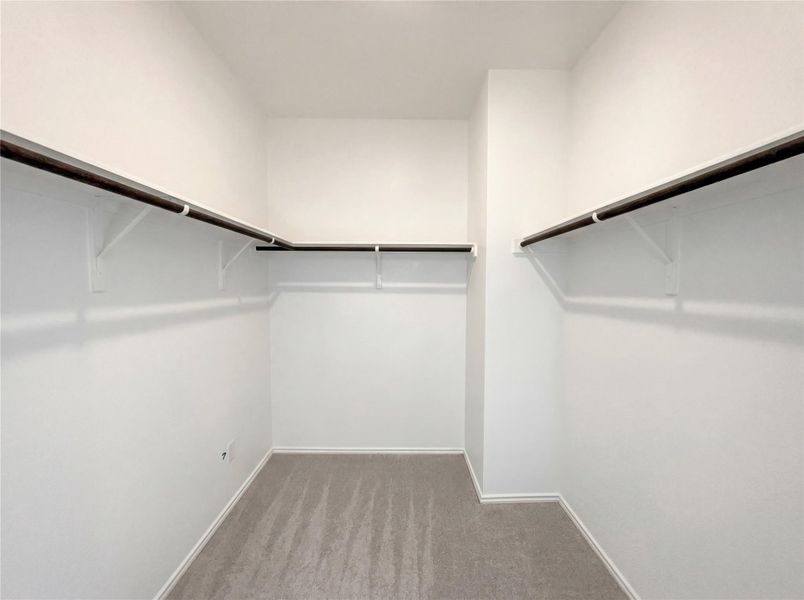 Spacious, unfurnished interior of a new home in The Colony, Bastrop (Image 25).