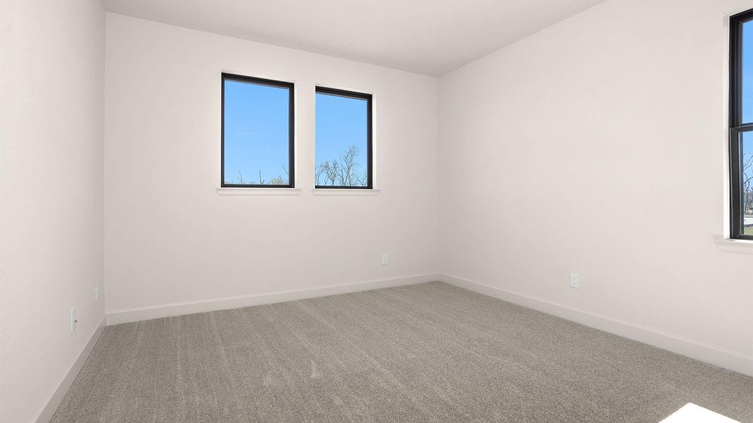 Spacious, unfurnished interior of a new home in Sienna, Missouri City (Image 10).