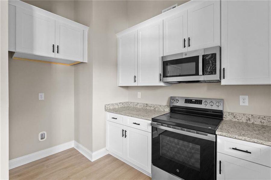 Furnished interior view inside a new home in , Cornelia (Image 9). Furnished interior view inside a new home in , Cornelia (Image 9).